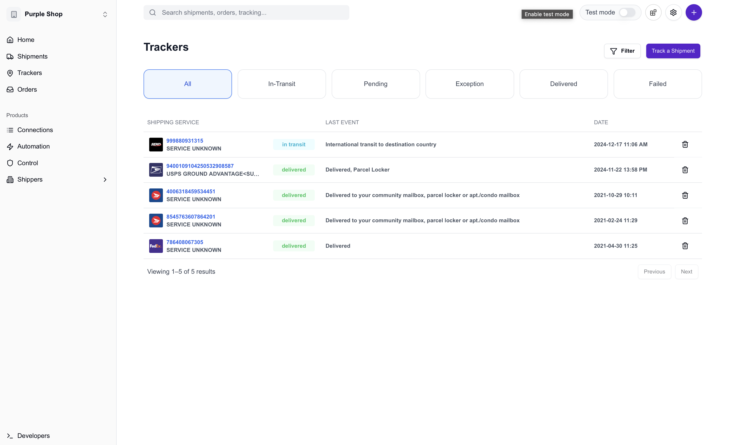 Trackers dashboard showing list of shipments with status badges and tracking information